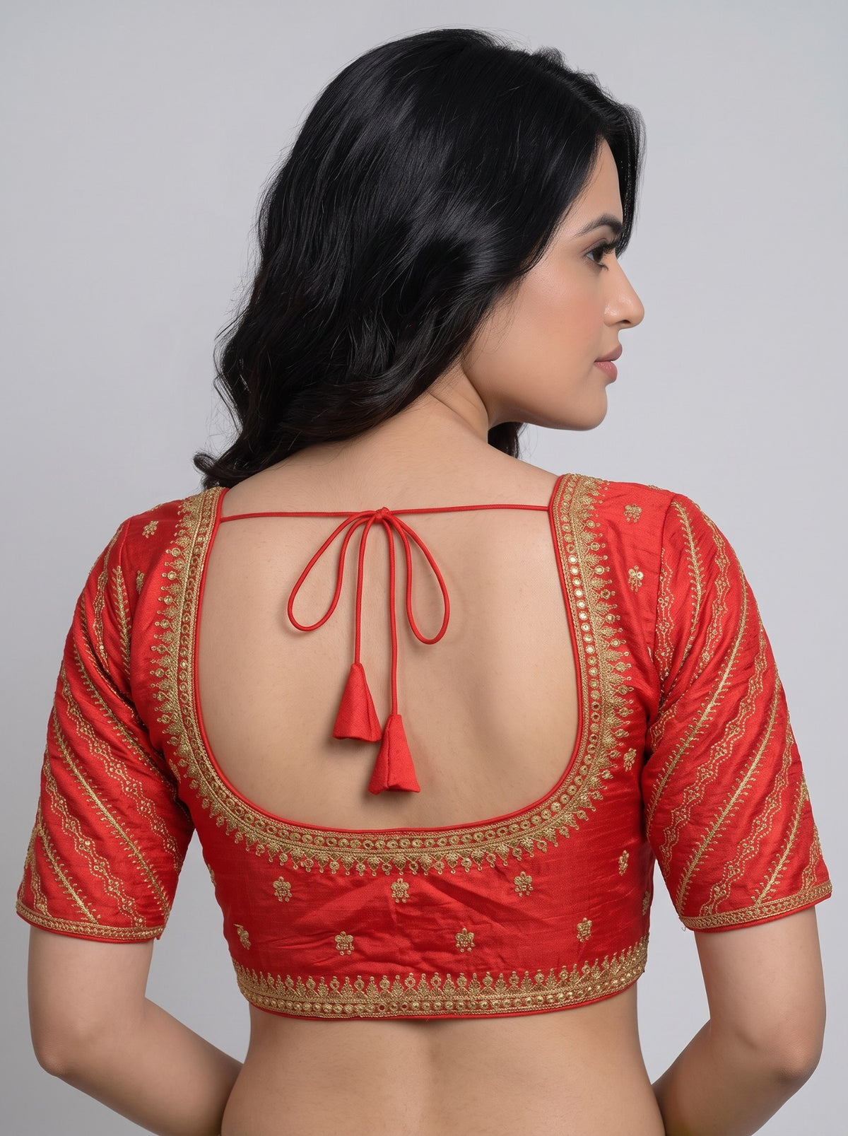 SurpriseLadies blouse red readymade designer blouse with intricate gold machine embroidery and back tie-up detail